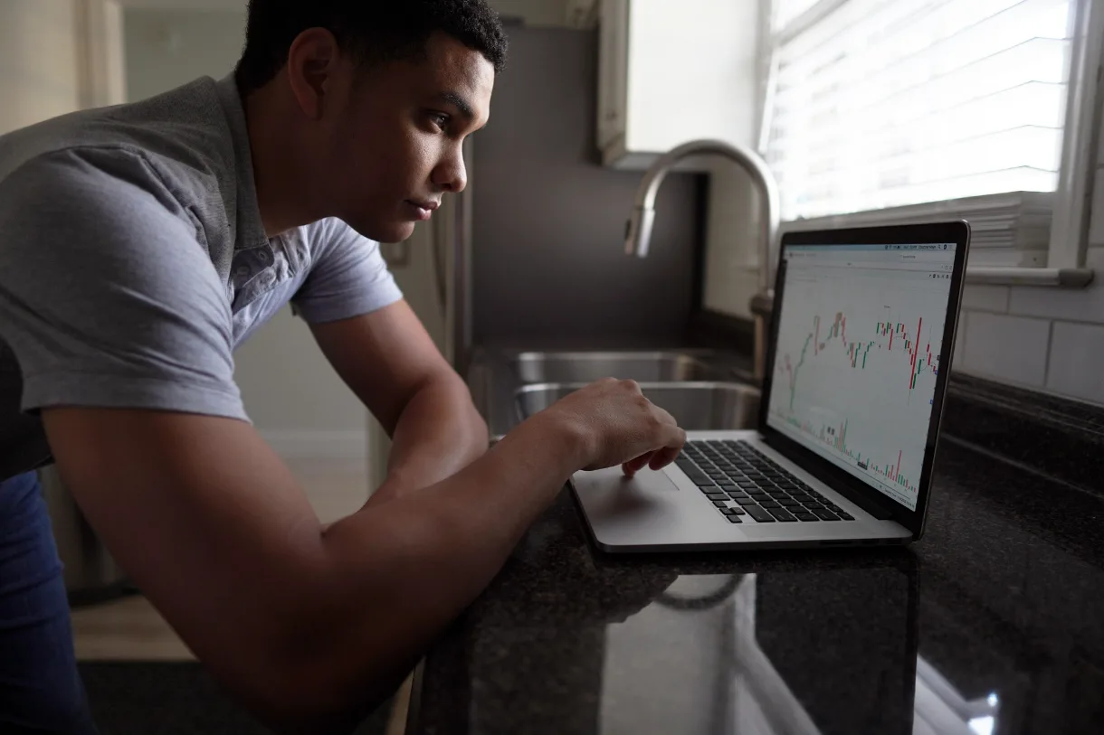 A man making trading decisions
