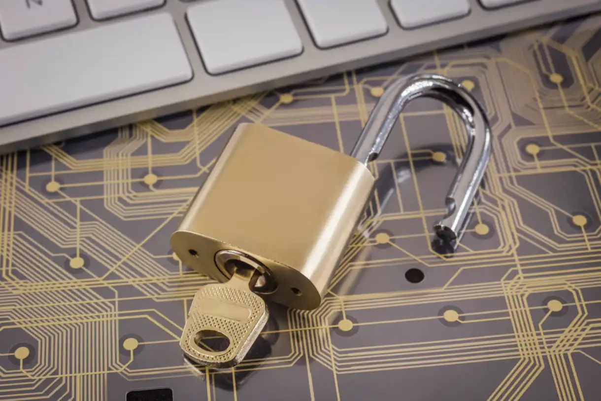 The opened padlock shows a hacked blockchain.
