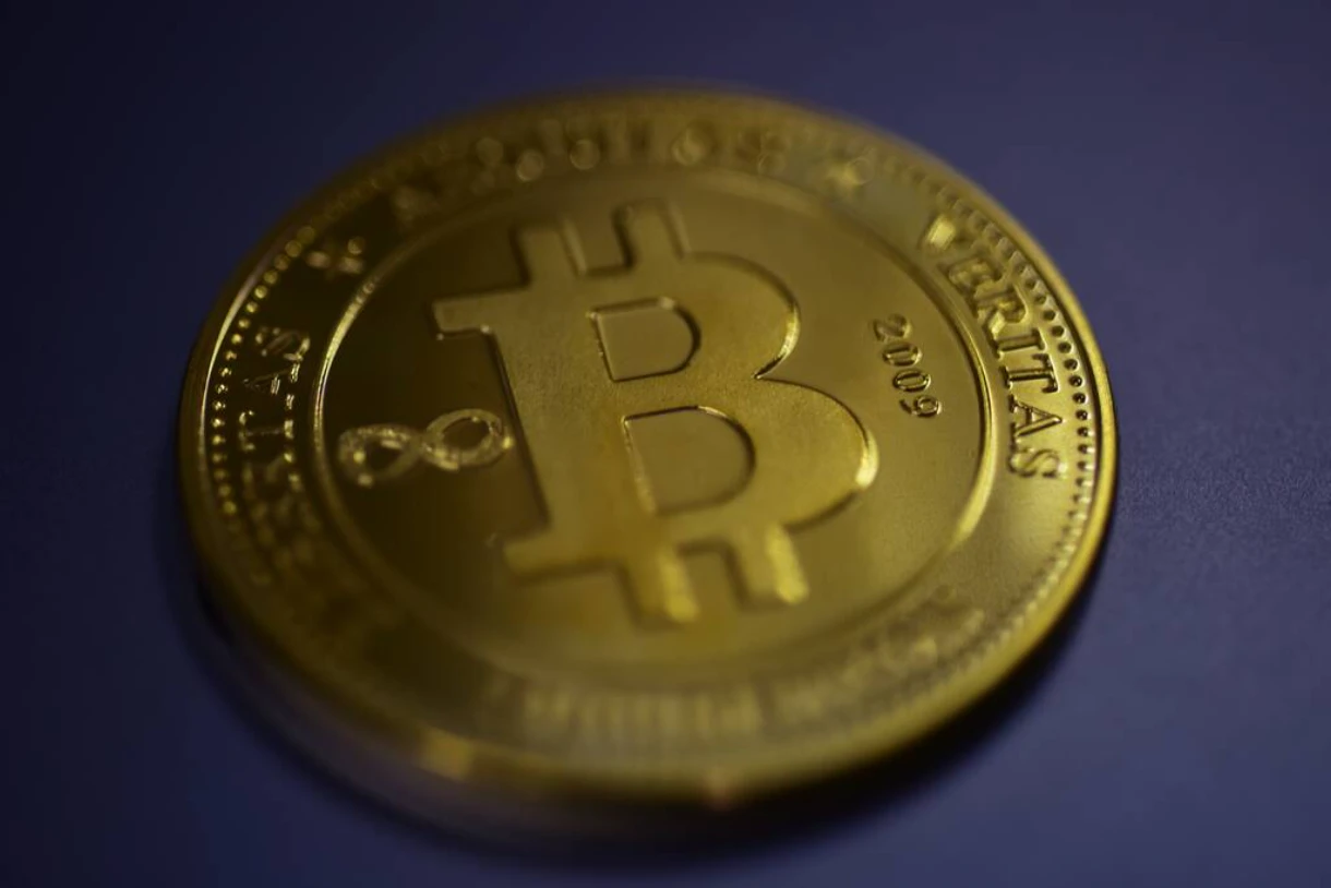 Bitcoin token on a surface.